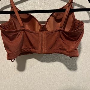 A beautiful light brown corset top the Size L front of top beading and design